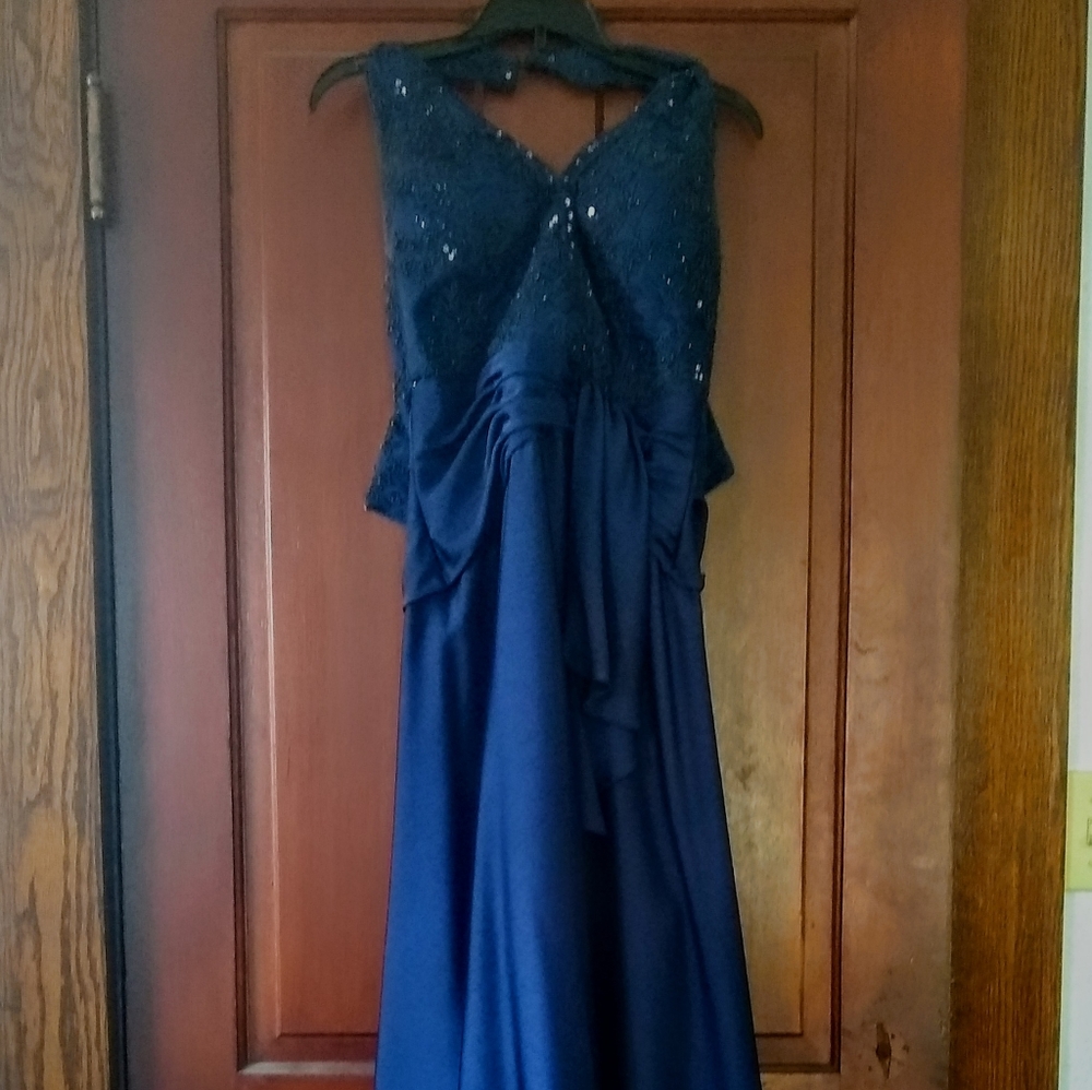 A beautiful, navy, Cameron and Blake formal dress.